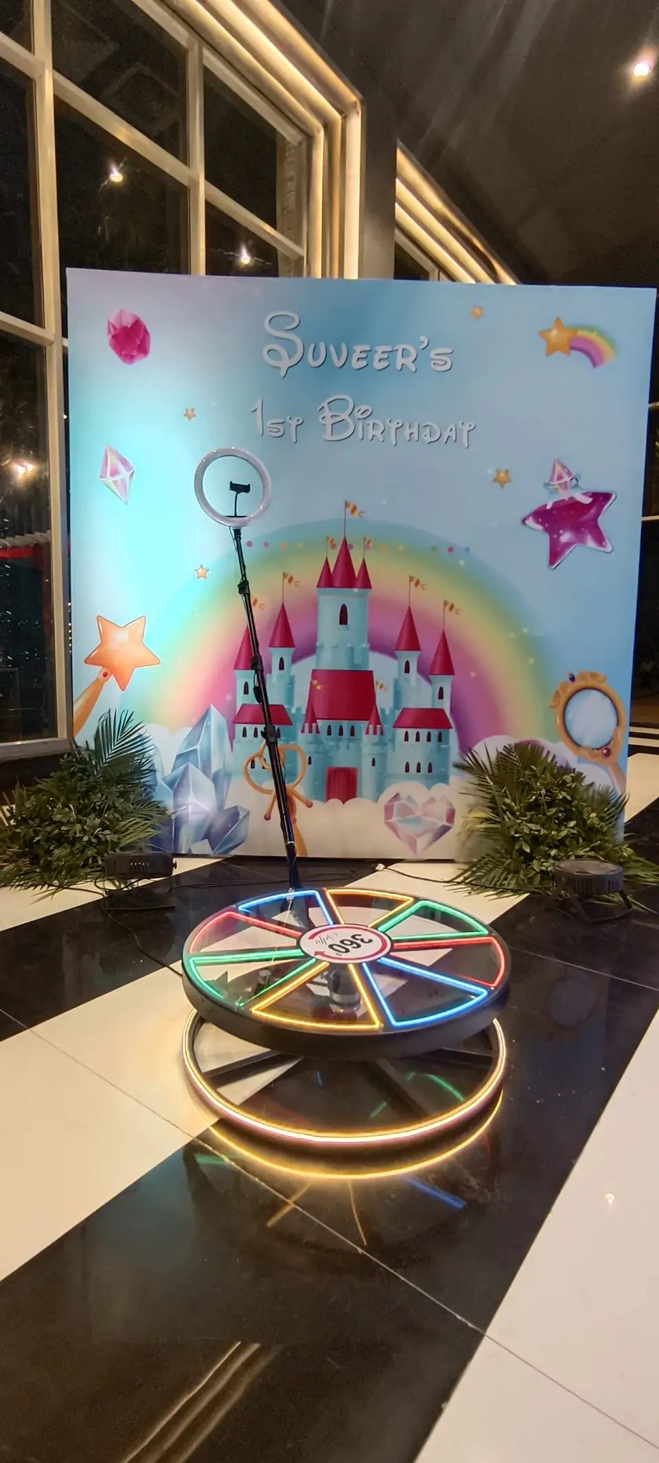 Close view of a 360 booth platform with themed event backdrop in Goa