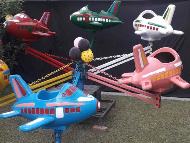 Guests enjoying aeroplane ride during a Goa celebration
