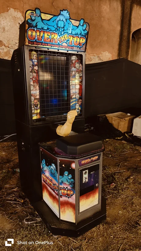 Arm wrestling arcade machine close-up with event lighting in Noida