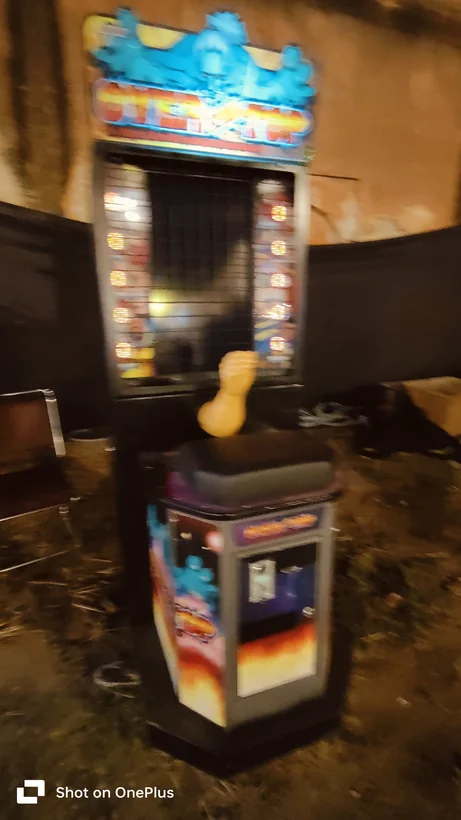 Arm wrestling arcade machine set up for an evening event in Noida