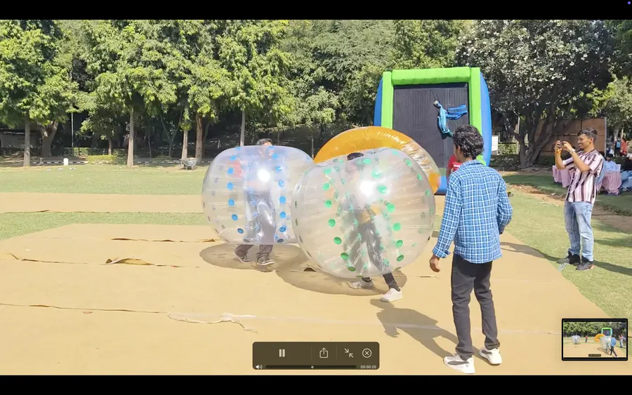 Guests enjoying body zorbing during a Gurgaon celebration