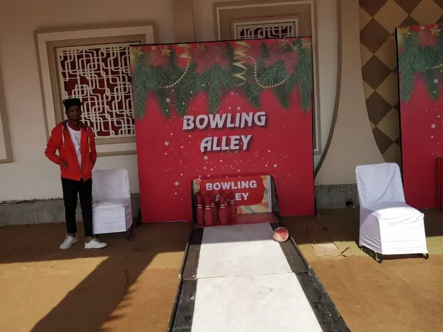 Guests enjoying bowling alley game during a Gurgaon celebration