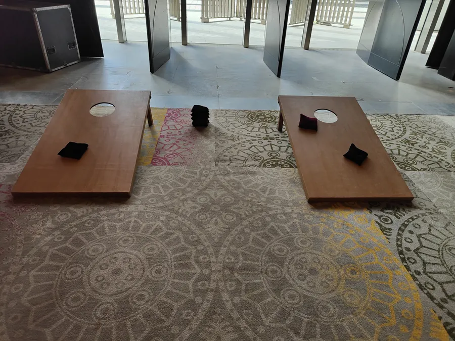 Guests enjoying cornhole game during a Gurgaon celebration