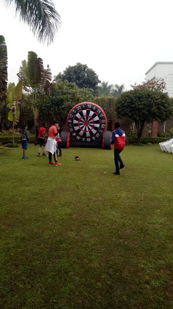 Children participating in a Foot Dart activity in Noida