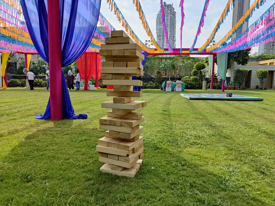 Guests enjoying giant jenga during a Goa celebration