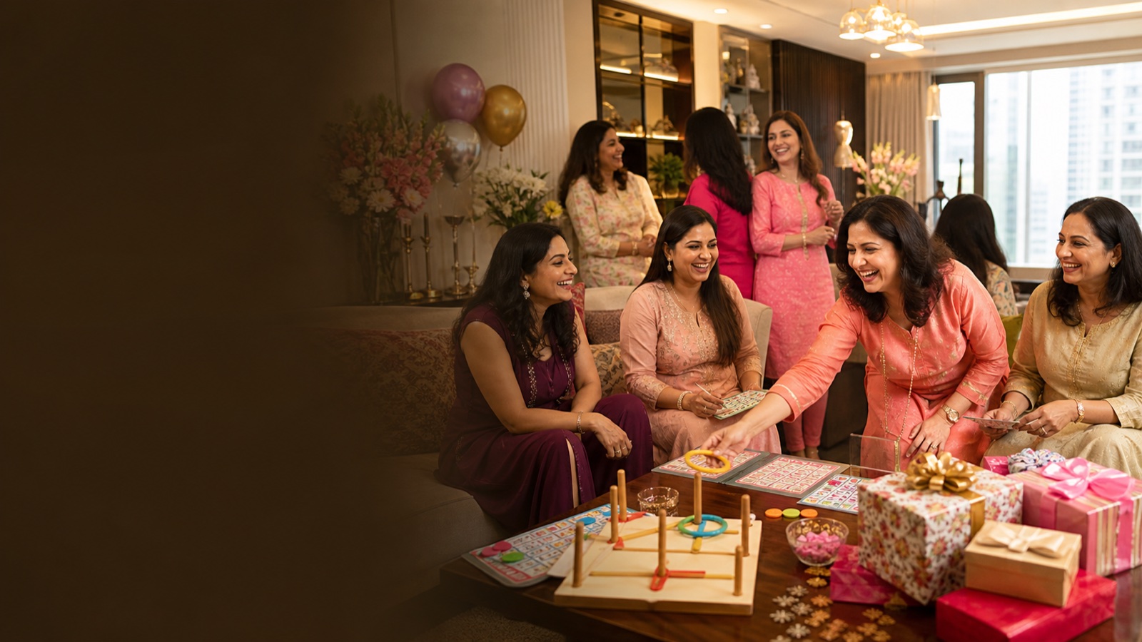 Women laughing and playing kitty party games at an elegant Mumbai gathering