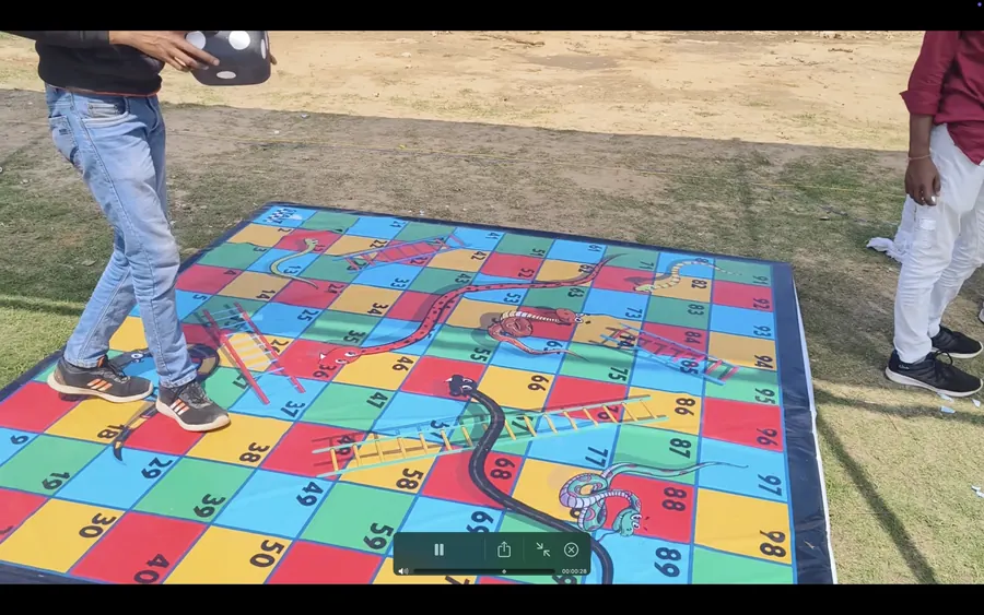 Event-ready snake and ladder game setup by Page One Memories in Goa
