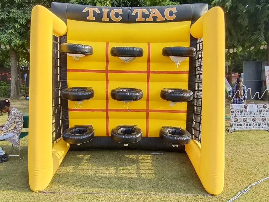 Guests enjoying tic tac toe game during a Goa celebration