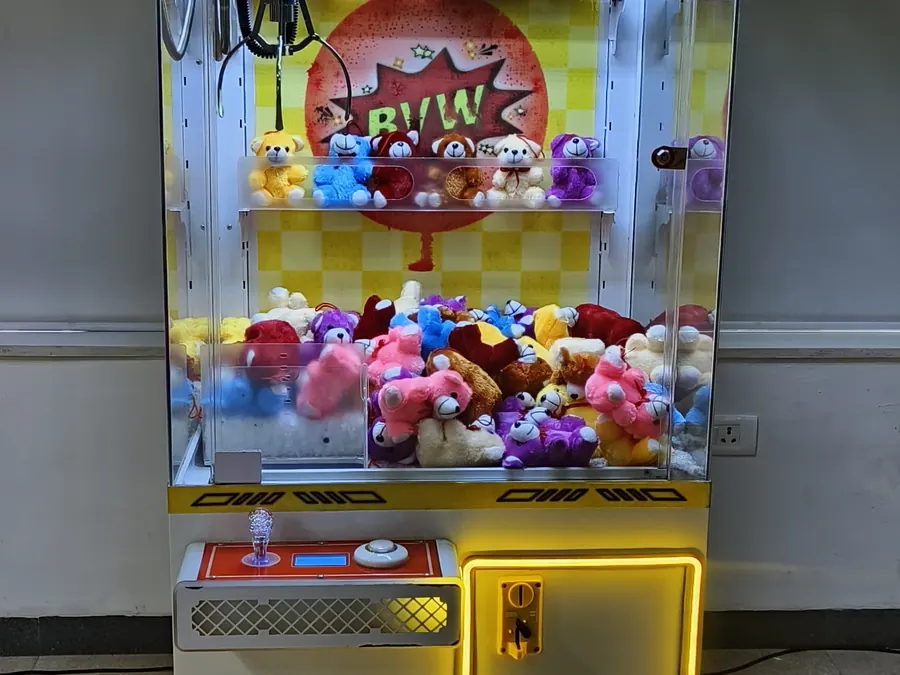 Event-ready toy claw machine setup by Page One Memories in Delhi