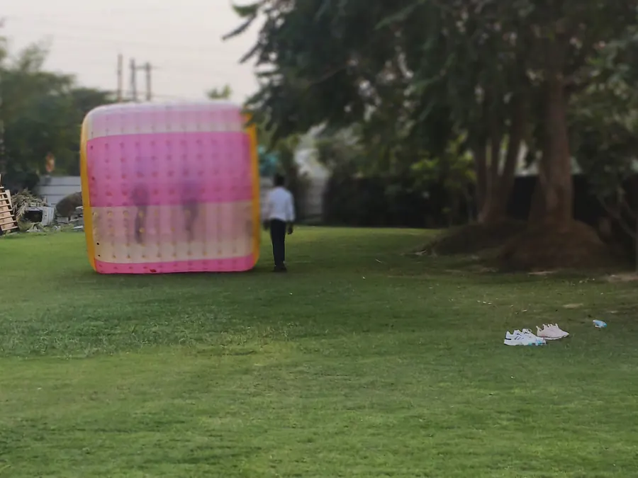 Guests enjoying zorbing roller during a Goa celebration