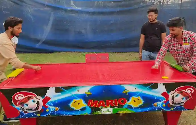Air hockey table rental Gurgaon, Air hockey table hire, Rent air hockey table near me, Hire air hockey, Air hockey for parties, Event game rentals Gurgaon, Entertainment for events in Gurgaon