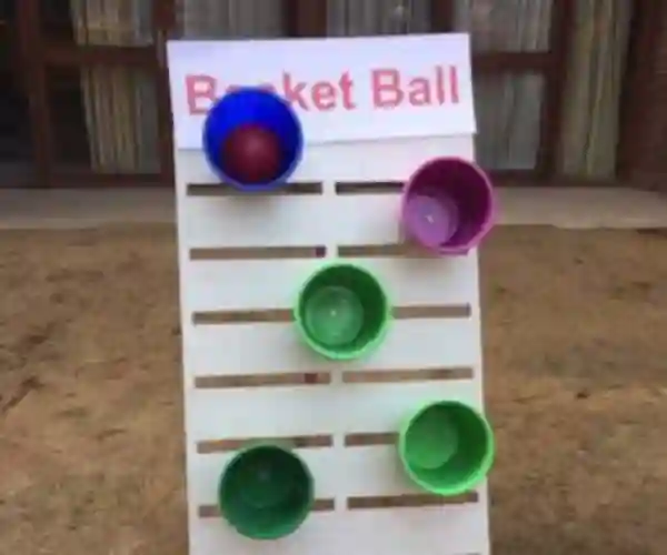 ball in the bucket game, ball and bucket game, balls in a bucket game, game with buckets and balls, bucket ball toss game, ball bucket toss carnival game, carnival games rental Gurgaon