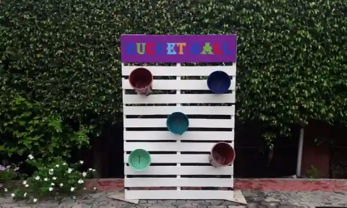 ball in the bucket game, ball and bucket game, balls in a bucket game, game with buckets and balls, bucket ball toss game, ball bucket toss carnival game, carnival games rental Gurgaon